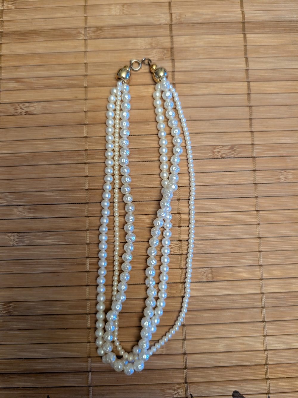 Multi-Strand White Pearl Necklace with Gold Accents